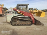 Used Takeuchi in yard